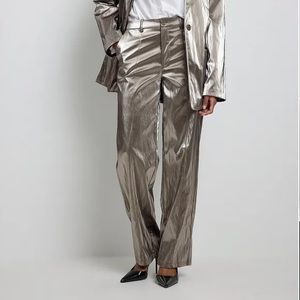 Silver metallic trousers brand new 👽